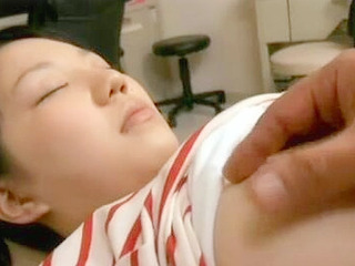 Under anesthesia, the unconscious teen virgin's creamy pussy is fondled by a dentist in Tokyo.